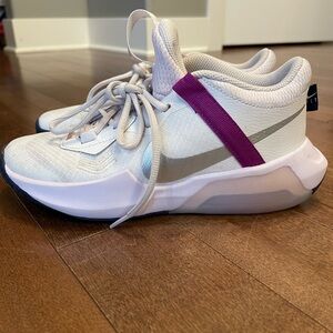 Girls Nike shoes size 4.5. Worn inside only.